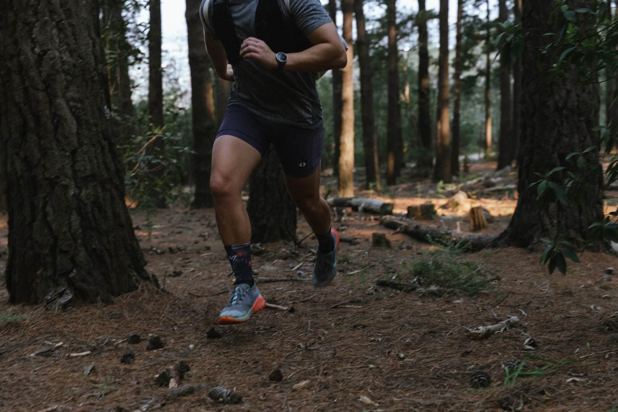 A man running in a forest